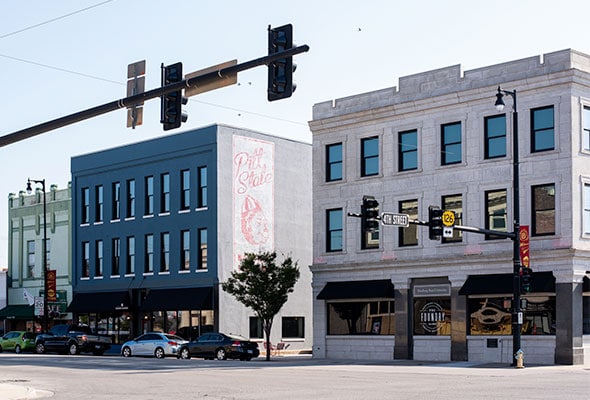 Block 22 at 4th and Broadway is shown revitalized and in its current form today in Pittsburg, Kansas.
